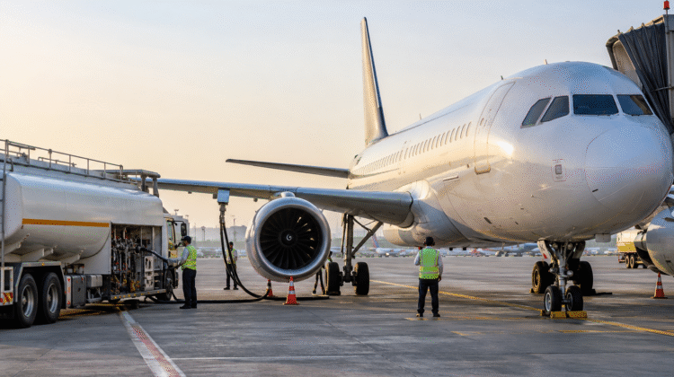 Aircraft refuelling at an airport, illustrating airline fuel surcharges — AI-generated
