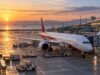 Air India route expansion — AI-generated representative aircraft at airport